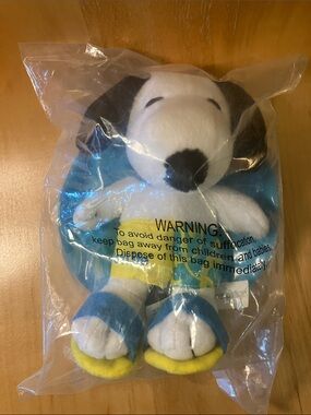 MetLife Snoopy Plush in Swim Trunks, Sandals, and an Inflatable Float.